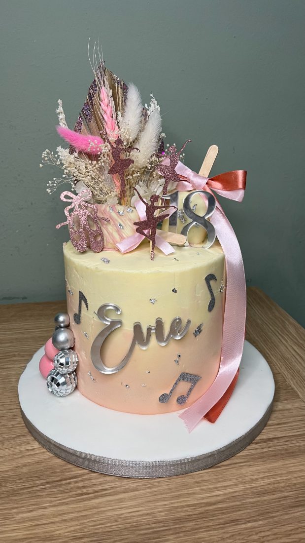 Peach ombre ballerina cake with dried flowers and disco balls